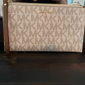 Like new Cream and brown MK wristlet
